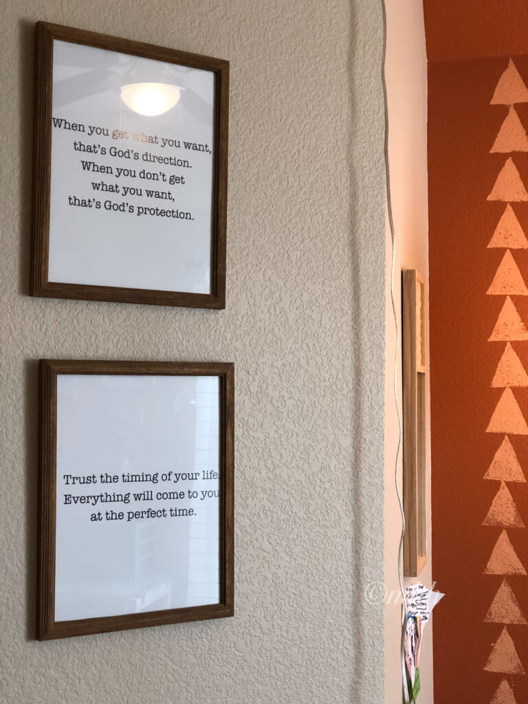 Home tour of Meena Harish | A printed and framed pictures of scenic landscapes on the walls.