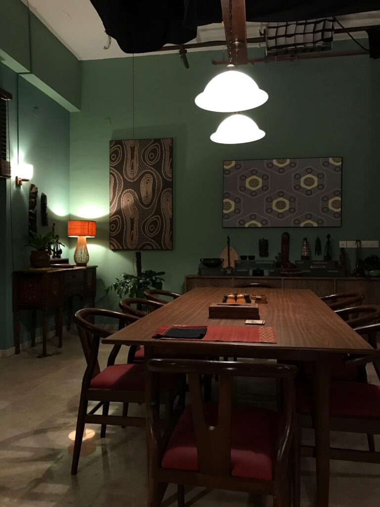 The dining furniture was designed and built as well and the partitions along with the extension in the kitchen re-upholstered - 'Sir' Indian Movie set | theKeybunch decor blog