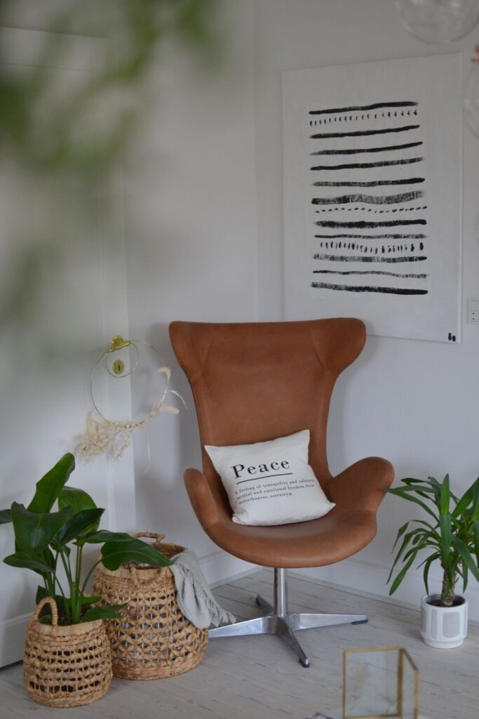 The chair and the basket planters at the corner of the room | Naina's Scandi-Minimalist Home with Indian Accents