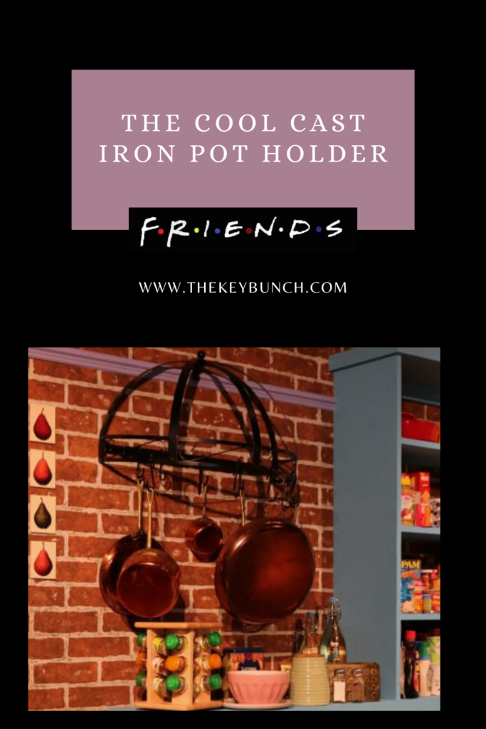 The cool cast iron pot holder and the copper pans hanging on the wall | DECOR ELEMENTS FROM THE SET THAT ARE COOL EVEN TODAY | theKeybunch decor blog