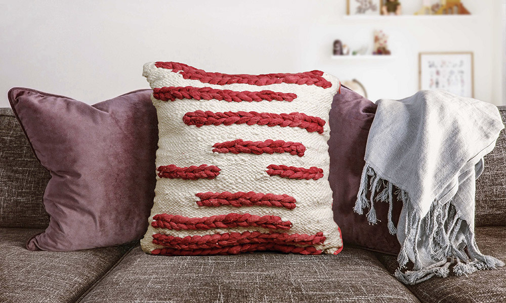 A throw alongside a woven cushion cover, made on the home tapestry loom | 6 Tapestry DIYs on Muezart's home-use loom