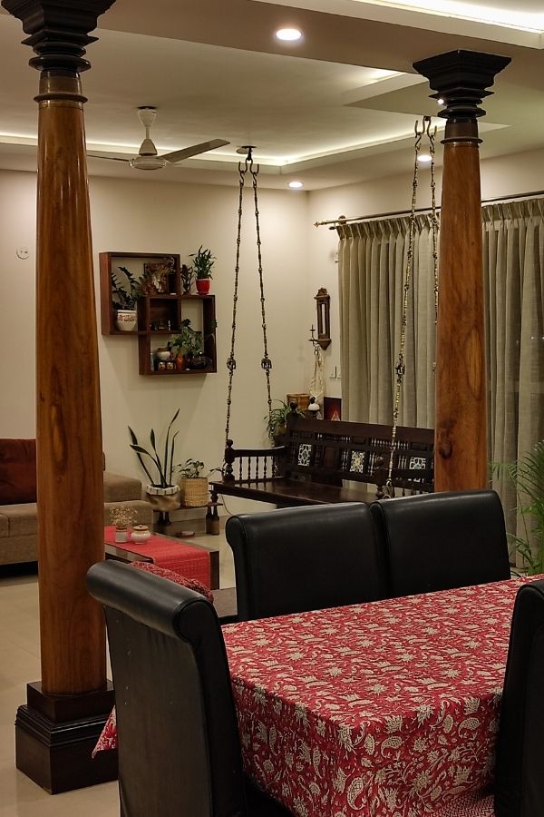 8ft pillars from Tamil Nadu installed in living room | Home Tour: A beautiful Antique Modern home in Bangalore