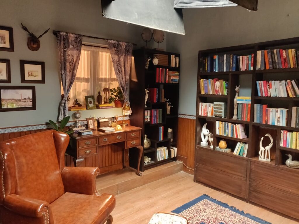 Villa Rashmi - A Heritage Gem in Mumbai | Vintage books on wooden shelf at the reading room | TheKeybunch decor blog