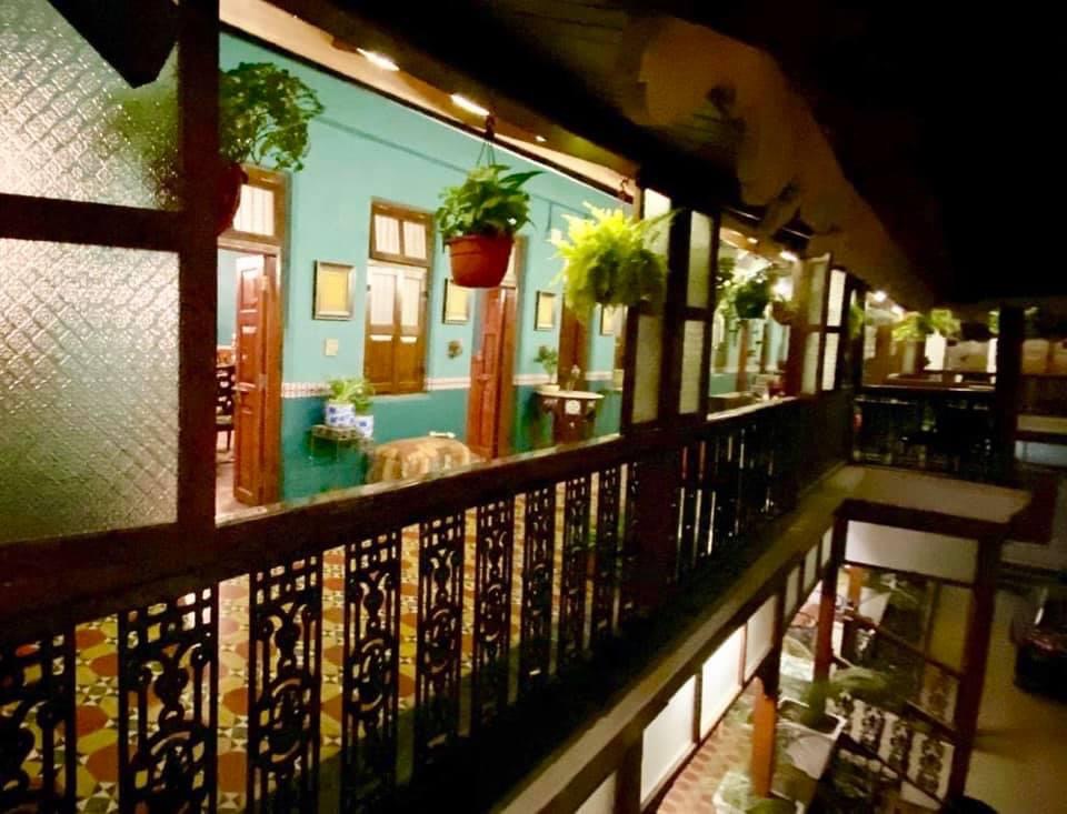 Villa Rashmi - A Heritage Gem in Mumbai | Hanging flower pot plant in veranda | TheKeybunch decor blog