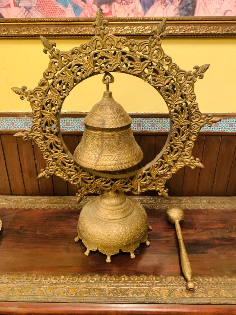 Villa Rashmi - A Heritage Gem in Mumbai | Vintage brass nautical ship wheel bell with brass hammer | TheKeybunch decor blog