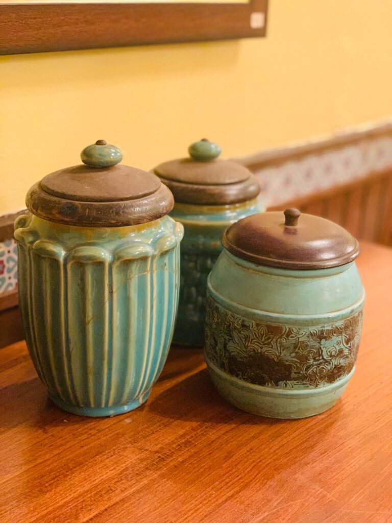 Villa Rashmi - A Heritage Gem in Mumbai | Vintage ceramic jar on top of the table at the bedroom | TheKeybunch decor blog
