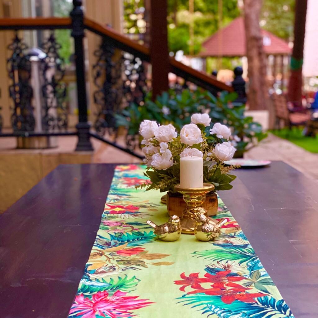 Villa Rashmi - A Heritage Gem in Mumbai | The table runner was decorated with fresh white flowers and candle stand holder | TheKeybunch decor blog