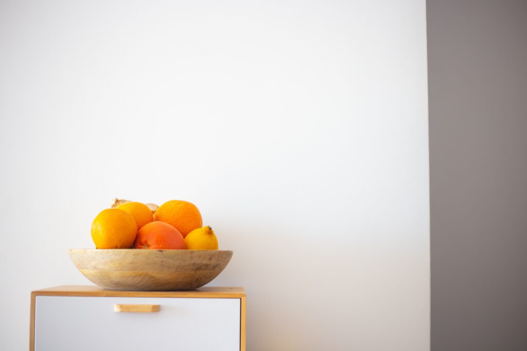 Fall Decor in India - Autumn Season | A bowl of citrus fruits on table top