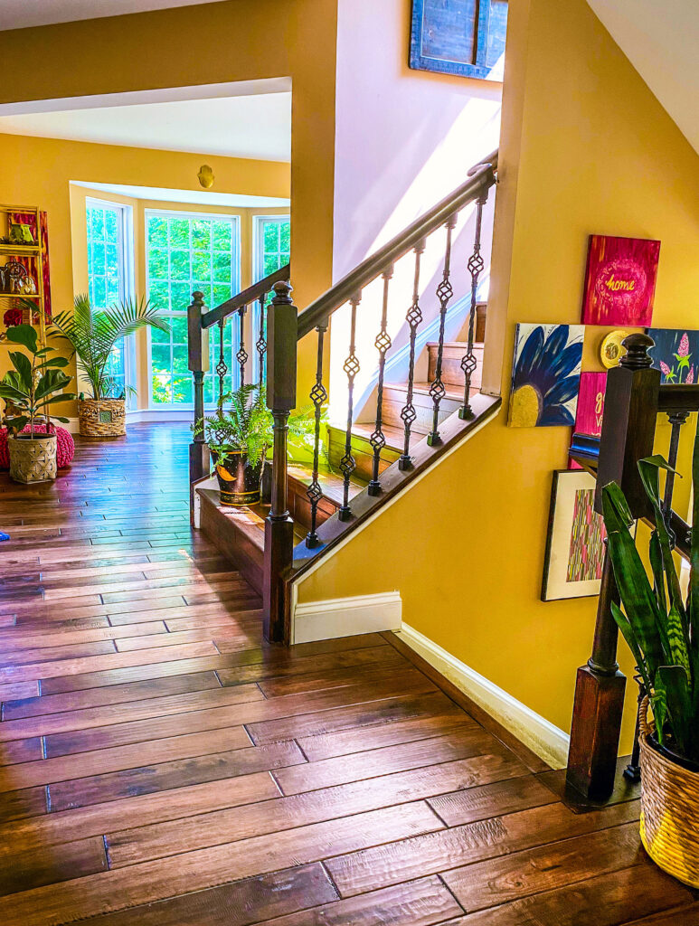 Chitra's Joy-Infused Boho Eclectic home | The beautiful entry staircase decor