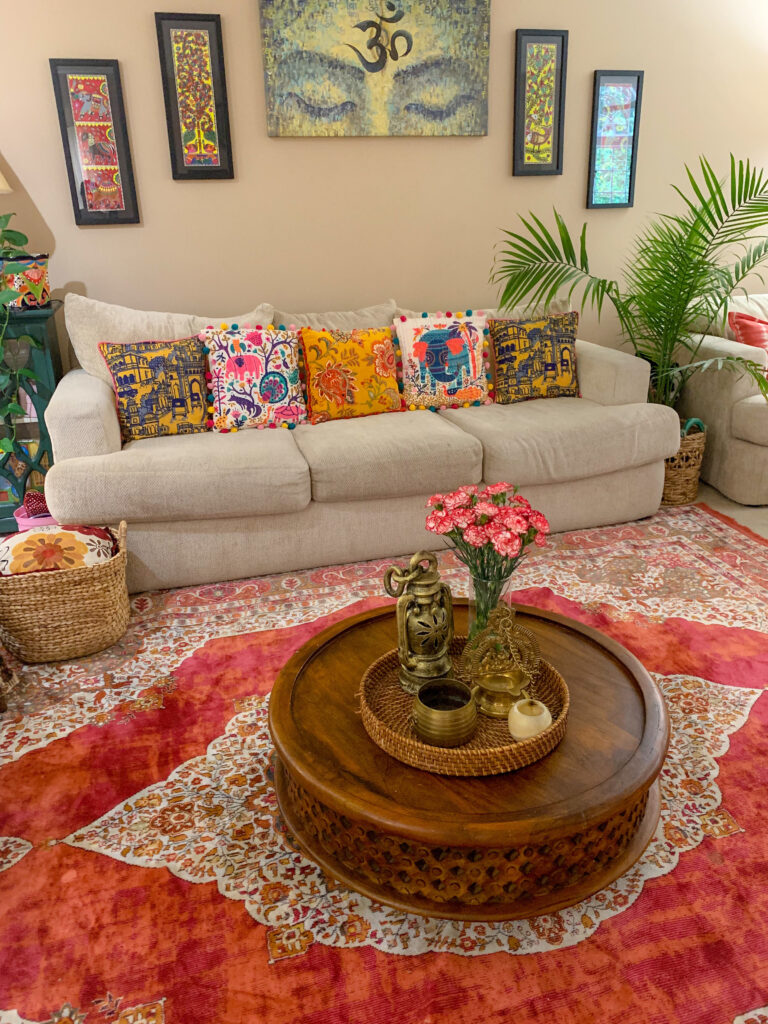 Chitra's Joy-Infused Boho Eclectic home | Energetic and colorful living room decor, lovely carpet and coffee table