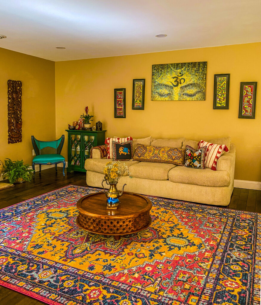 Chitra's Joy-Infused Boho Eclectic home | Energetic and colorful living room decor, lovely carpet and coffee table