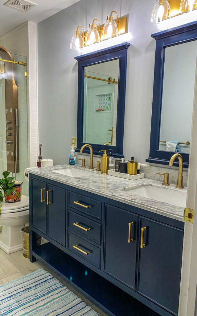 Chitra's Joy-Infused Boho Eclectic home | The beautiful blue bathroom with light countertop