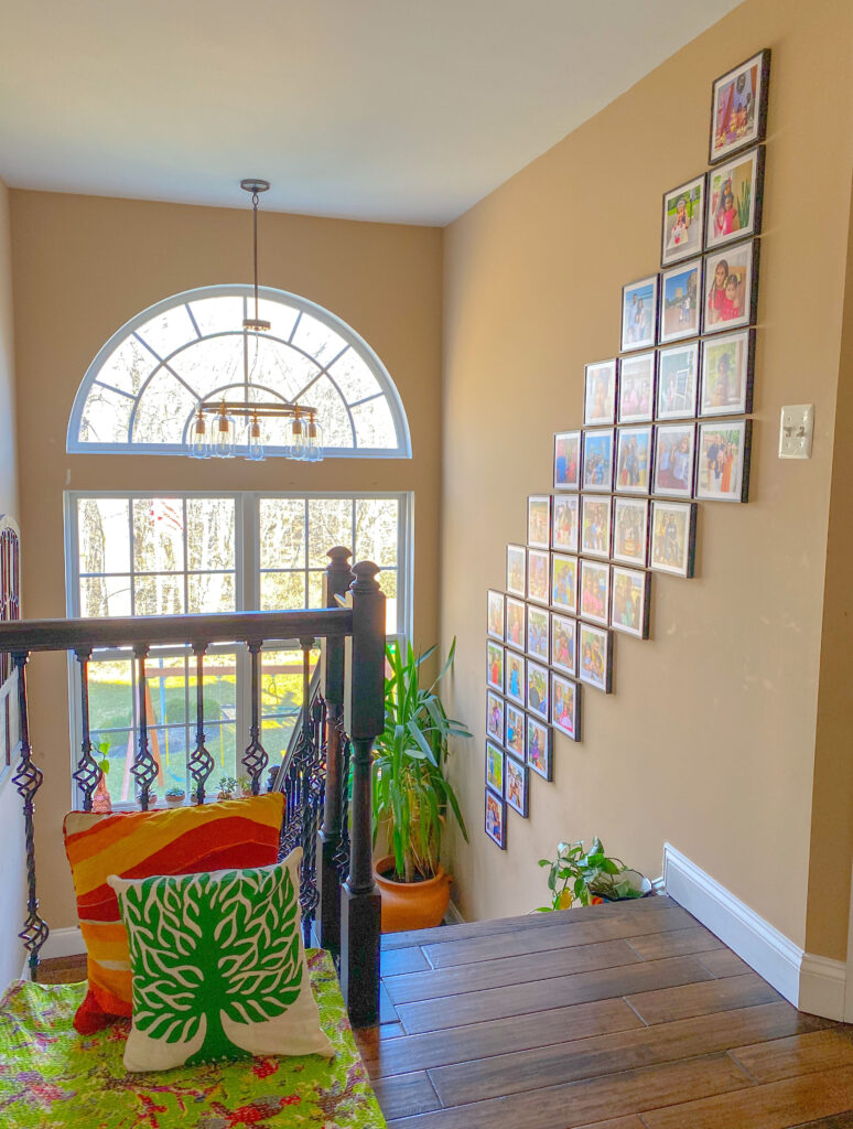 Chitra's Joy-Infused Boho Eclectic home | The beautiful gallery wall in a stairwell