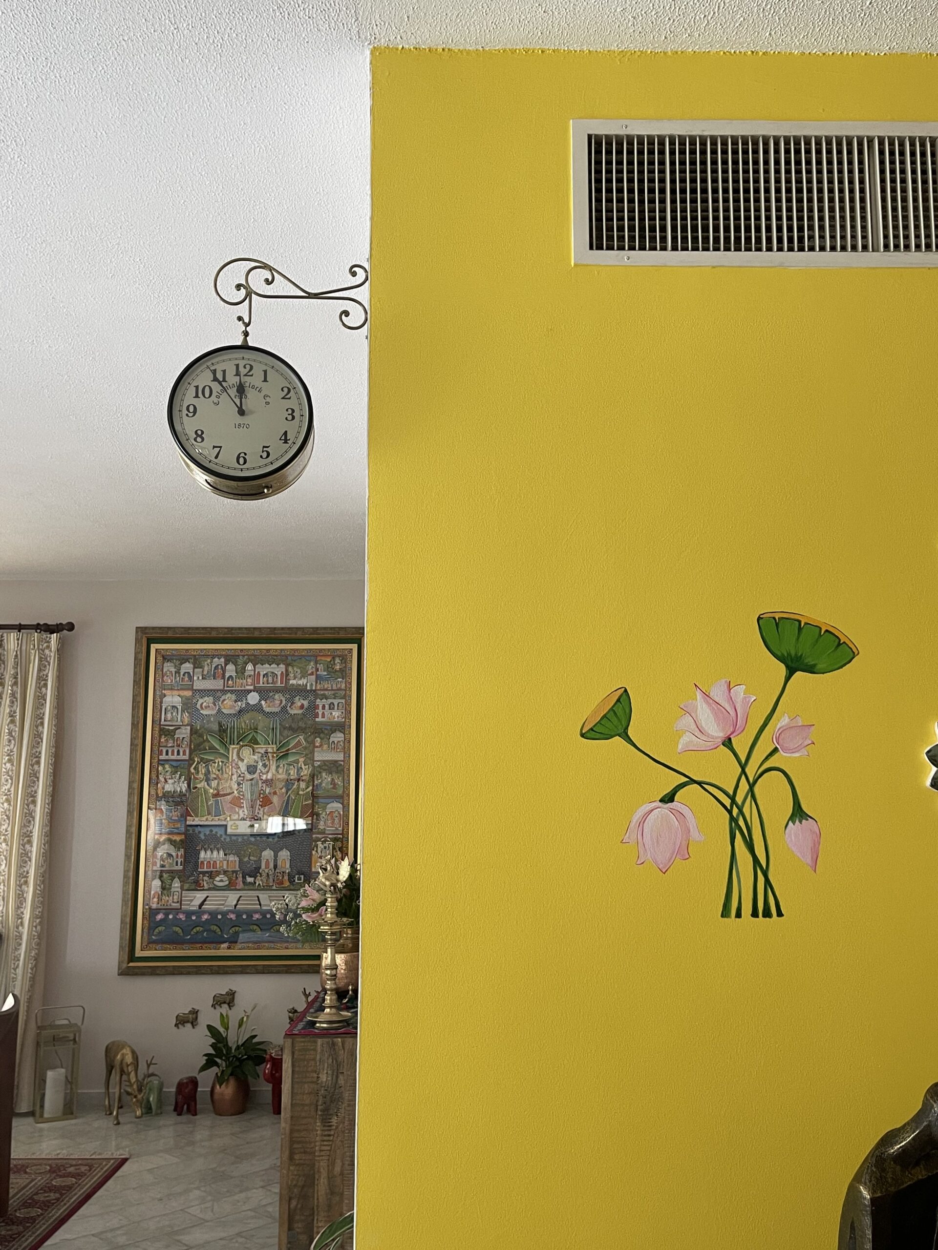 Prameela Nair's Art-Infused Home Abudhabi | Art work on yellow wall