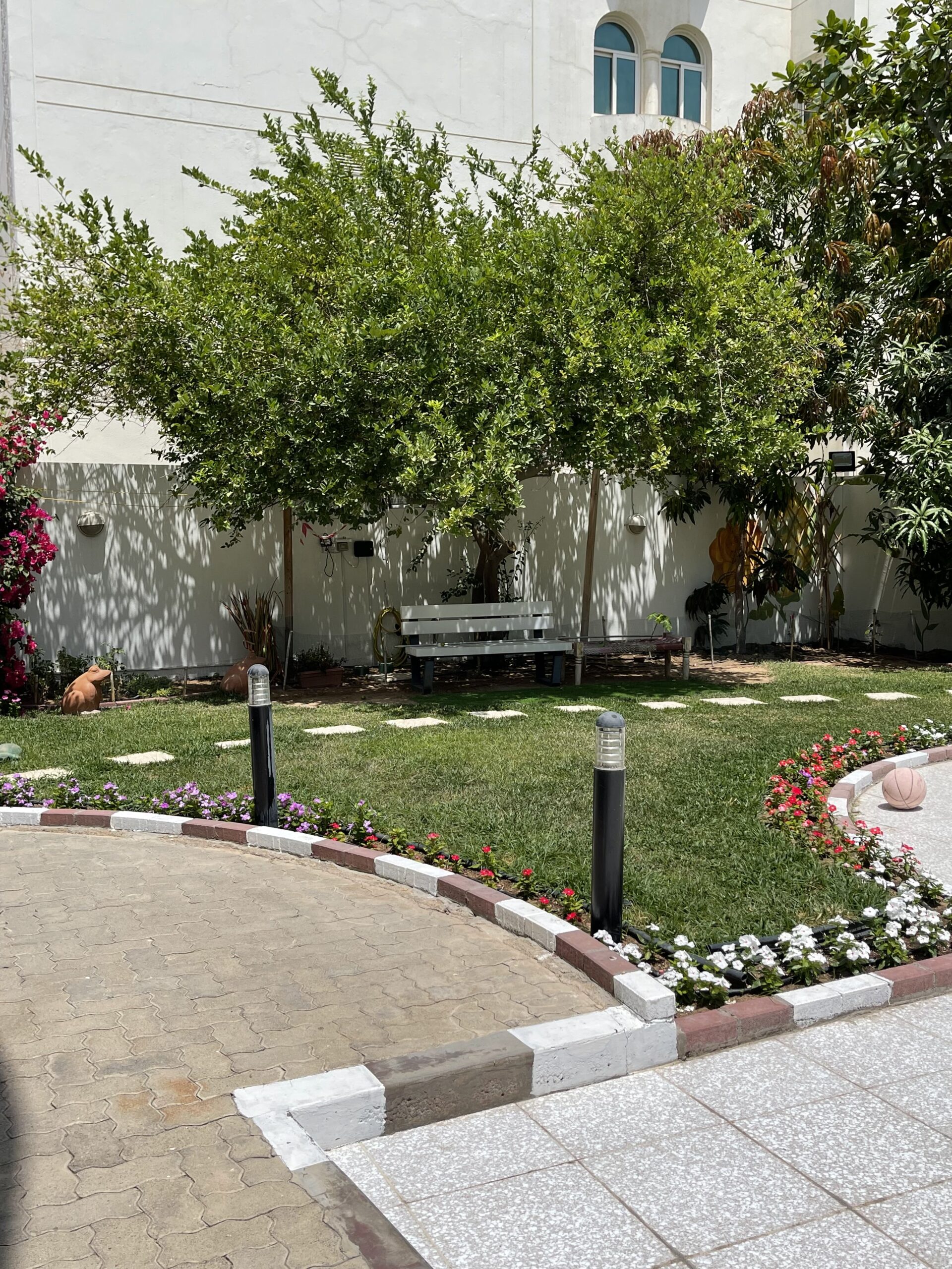 Prameela Nair's Art-Infused Home Abudhabi | A beautiful lush green garden