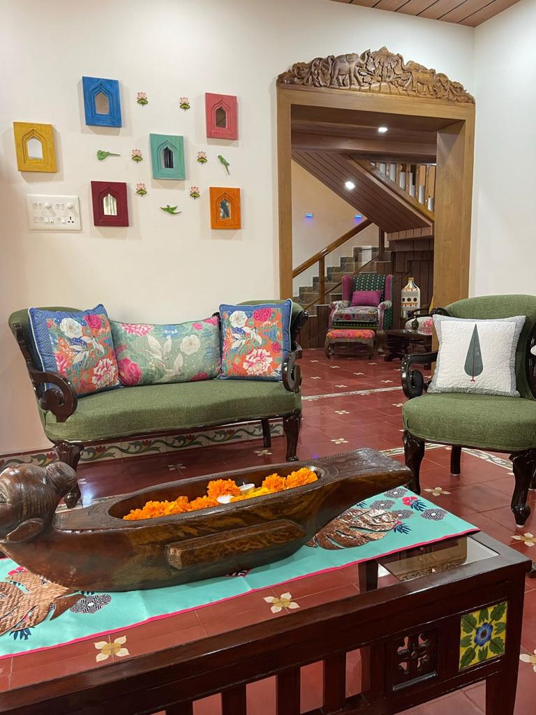 Prameela Nair's Palakkad Home | Antique Indian decor elements, wooden traditional furniture and athangundi tiles at Prameela living room