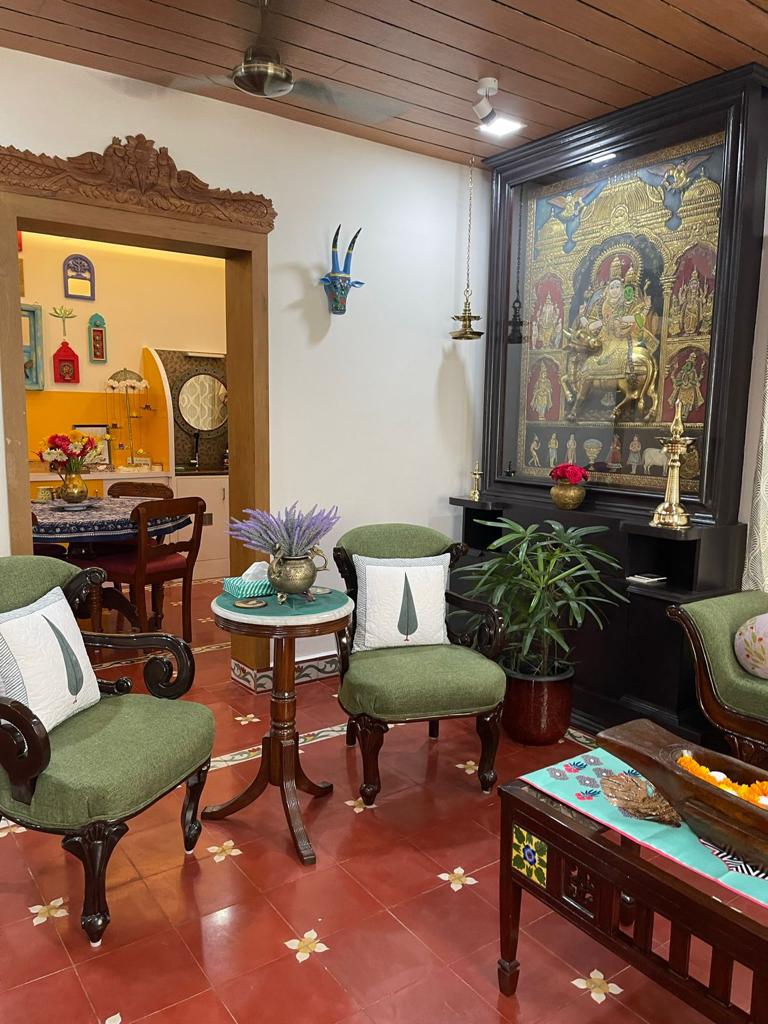 Prameela Nair's Palakkad Home | Prameela collected furniture and Tanjore pieces which is absolutely rare fitted on a massive panel in her small living space