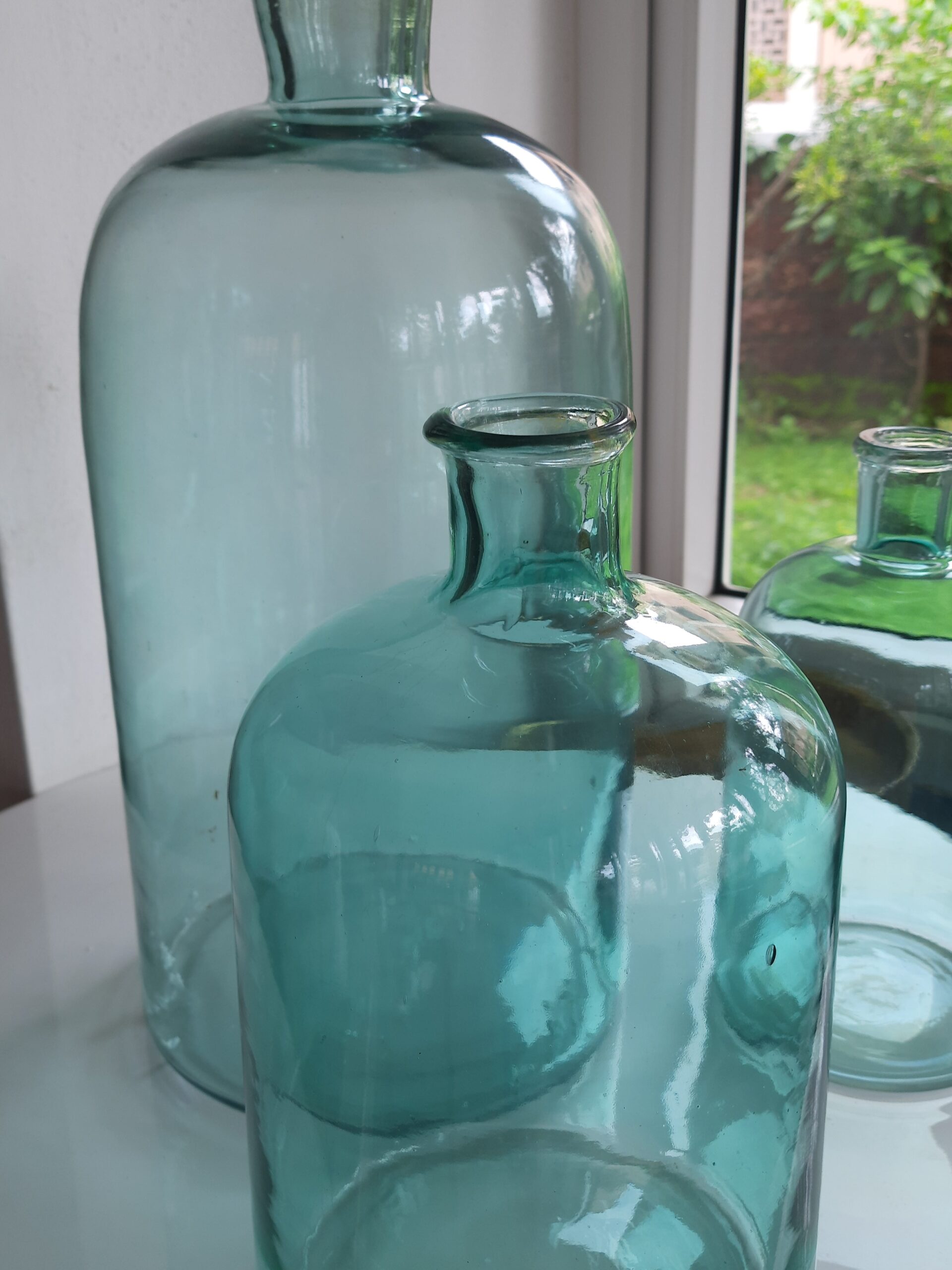 Demijohns in Indian Decor | Set of 3 ocean green glass bottles for home decor