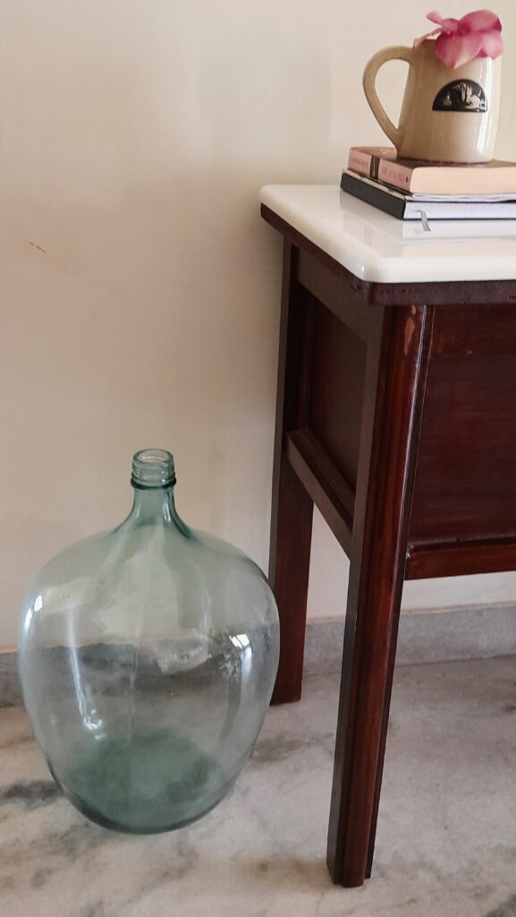Demijohns in Indian Decor | Placing demijohn next to a larger piece of furniture