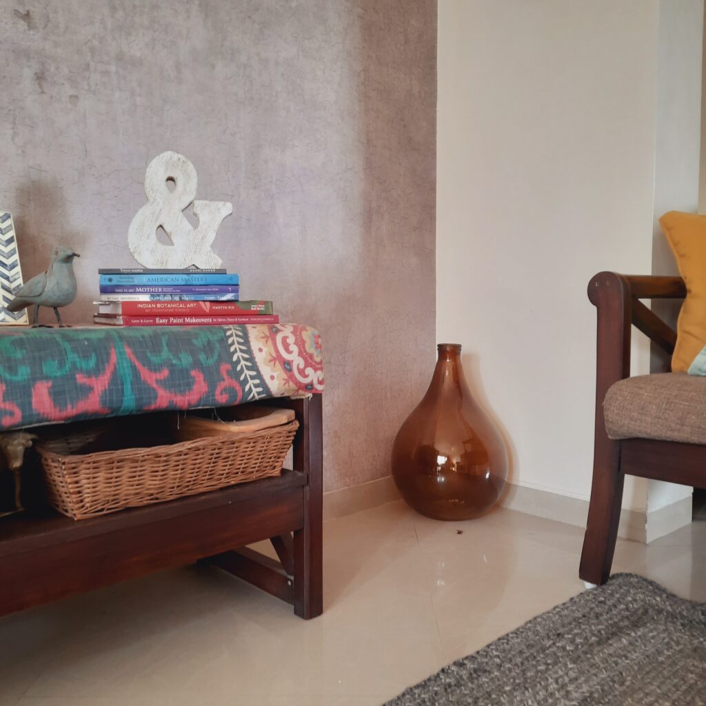 Demijohns in Indian Decor | Vintage large green demijohn at the corner of the room