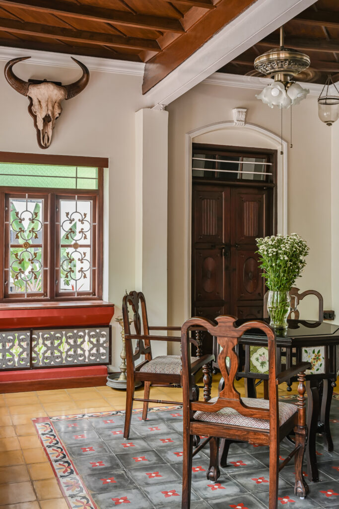 Raja’s Cottage - A traditional Mangalore home with a Chettinad Flavour | chettinad tiles and a bison head on the wall