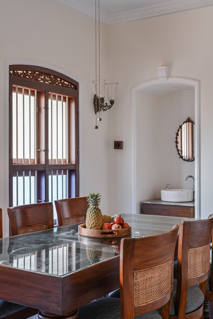 Raja’s Cottage - A traditional Mangalore home with a Chettinad Flavour | dining room and woven dining chairs