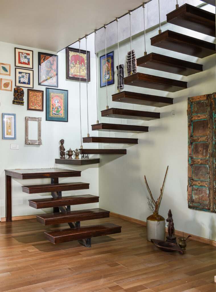 Swati Seraan's penthouse in Bengaluru | Staircase with gallery of art collection