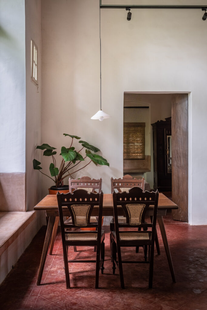 The dining room with green plant at the corner | Heritage home in Parra