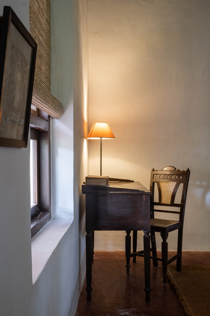 An antique wooden study table and chair |