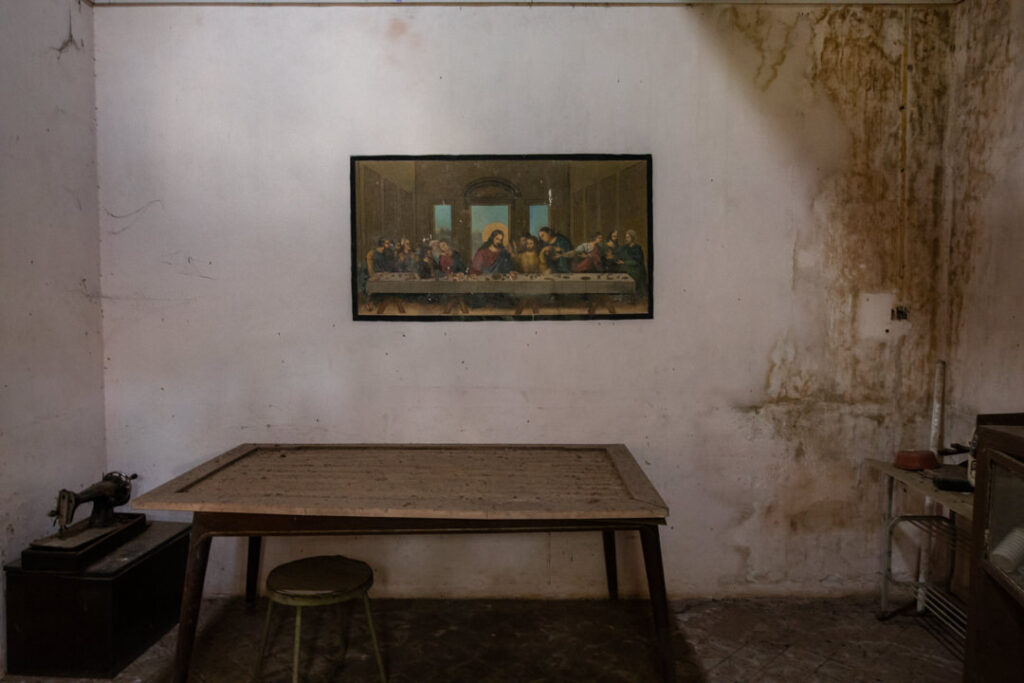 The dining table and the Last Supper picture on the wall | Heritage home in Parra