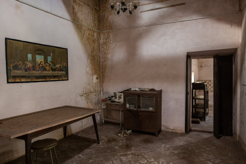 The dining table, the side board and the Last Supper picture on the wall | Heritage home in Parra