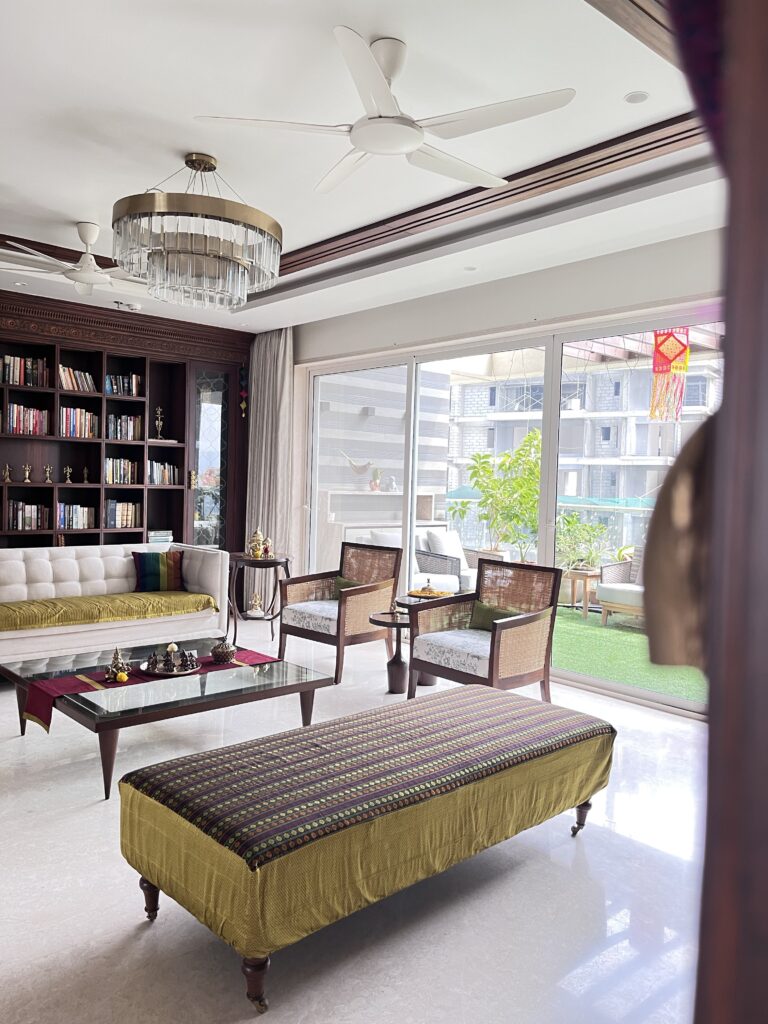 Living area with large window | Ranjana and Milind's apartment in Pune