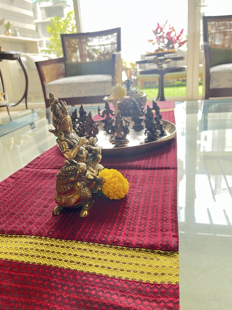 Center table decor with brass artifacts | Ranjana and Milind's apartment in Pune