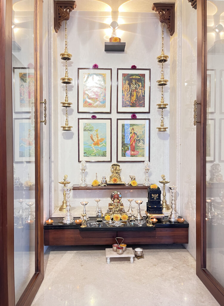 Decorated the pooja room with merigold flowers, lanterns, diyas and more | Ranjana and Milind's apartment in Pune