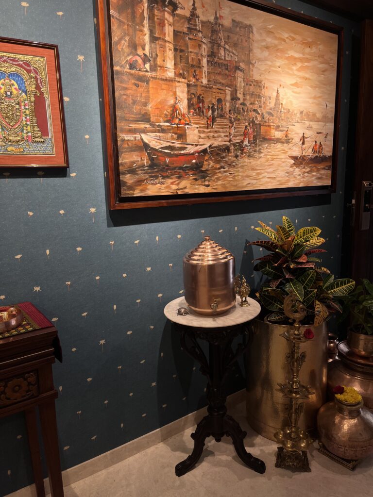 Vintage water dispensers and large vessels in the entrance foyer | Ranjana and Milind's apartment in Pune