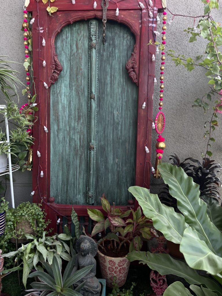 This door/window was brought from an old wada house that was demolished | Ranjana and Milind's apartment in Pune