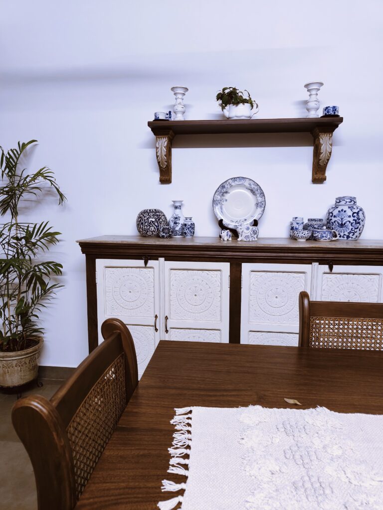 blue and white pottery collection in dining room | Girija home tour in Kochi