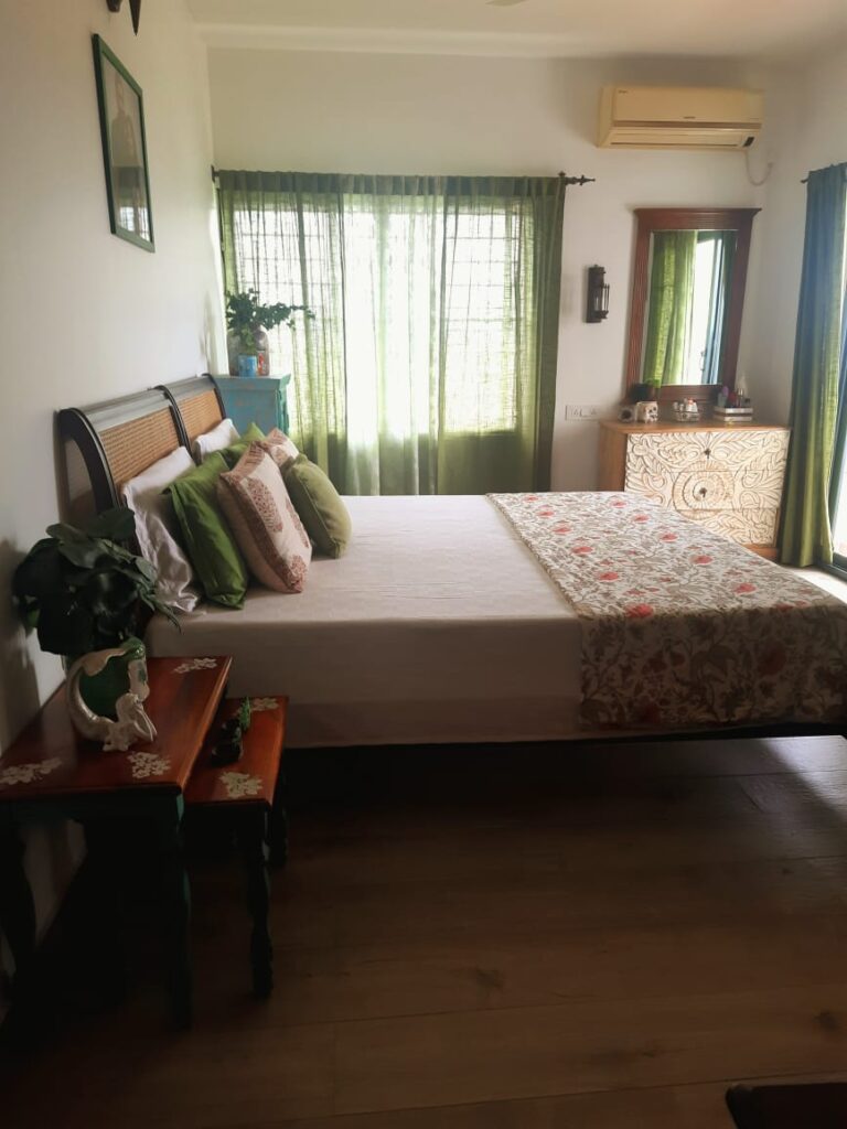 Bedroom with window view | Girija home tour in Kochi