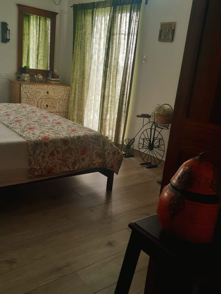 Master bedroom with window view | Girija home tour in Kochi