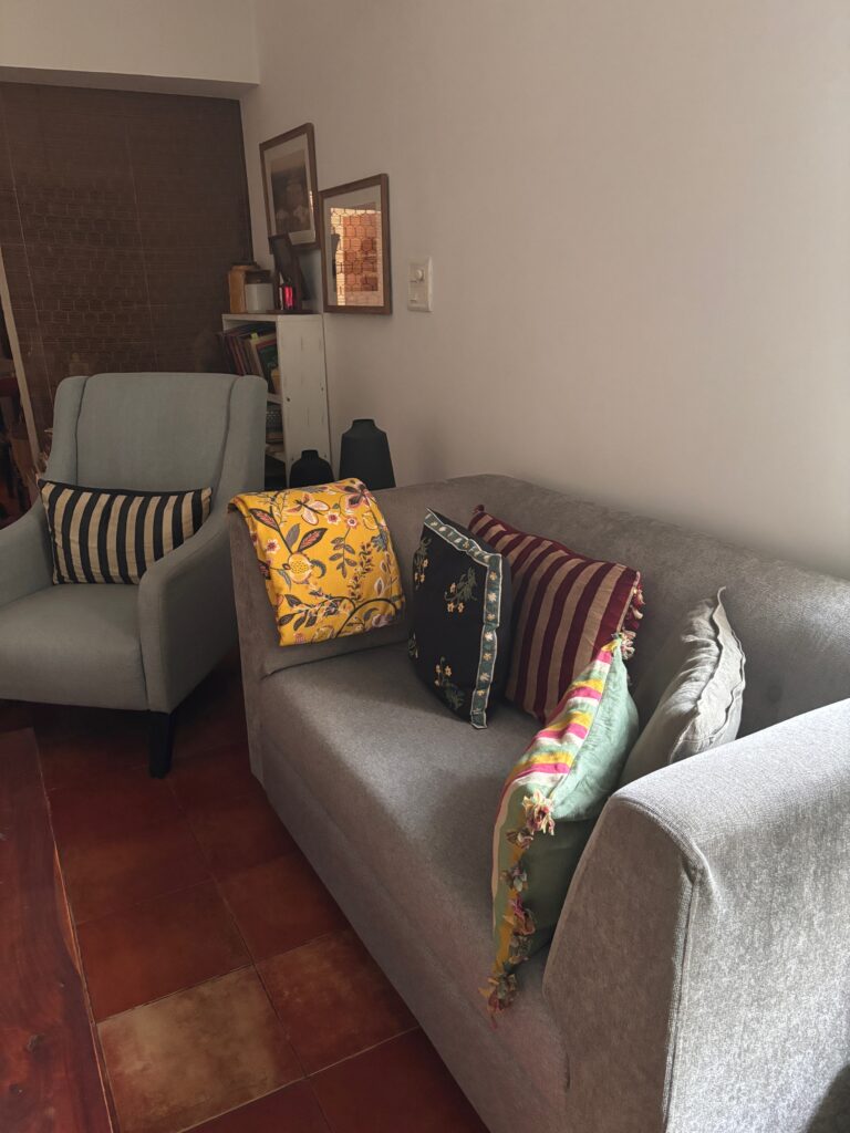 Home tour of Supreet in South Delhi | Living room sofa set with colorful cushion cover