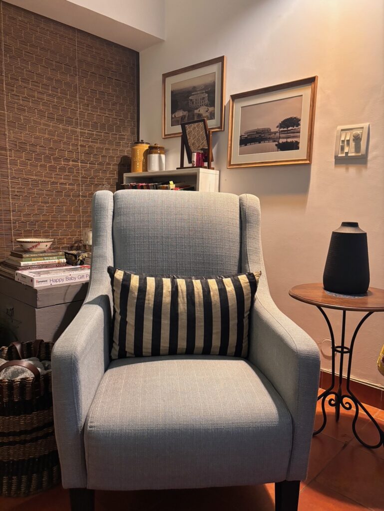 Home tour of Supreet in South Delhi | gray wing chair at the living room